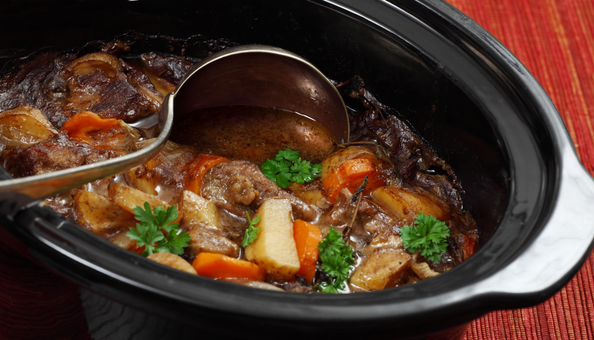 Rich Irish Guinness stew lamb and sausages